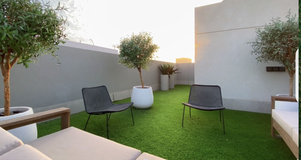 Create the perfect place to socialize with synthetic grass.